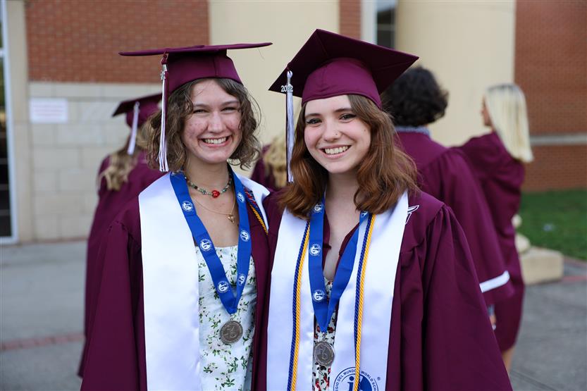 Graduates wearing maroon robes